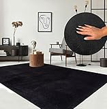 the carpet Relax Moderner Flauschiger Kurzflor Teppich, Anti-Rutsch Unterseite, Waschbar bis 30 Grad, Super Soft, Felloptik, Schwarz, 60 x 110 cm